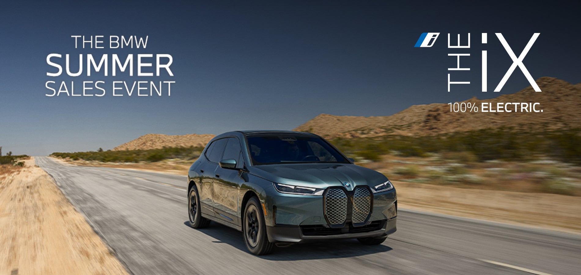 BMW iX conduciendo por el desierto